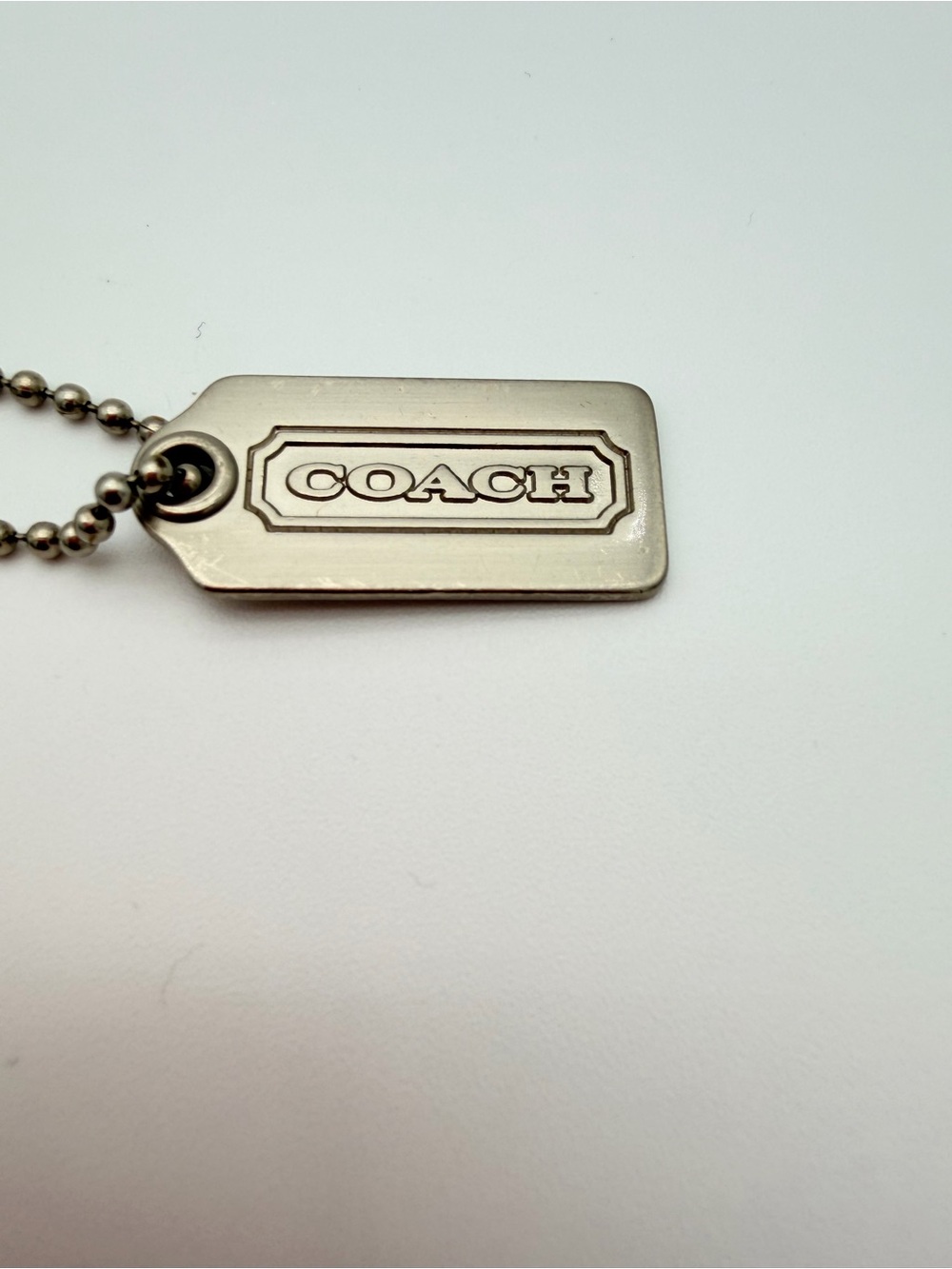 COACH Silver Logo Hang Tag Small